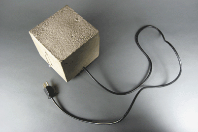 block of cement with power cord